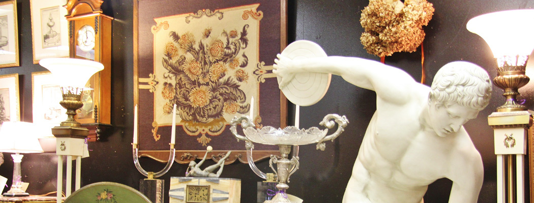 Antiques, collectibles, or vintage items on display by Dealer 35 at Warson Woods Antiques Gallery in St. Louis.